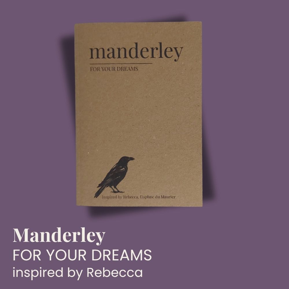 A kraft paper notebook or journal titled 'manderley FOR YOUR DREAMS' with a black raven illustration, shown on a purple background with additional text reading 'Manderley FOR YOUR DREAMS inspired by Rebecca'.